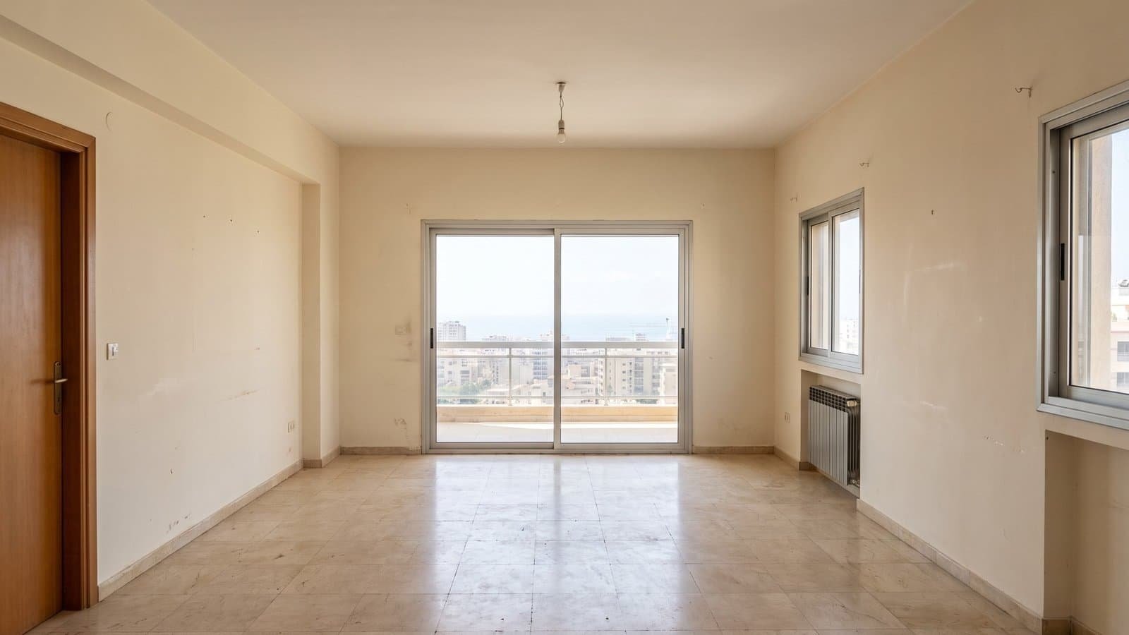 Empty to furnished: before, the original photo