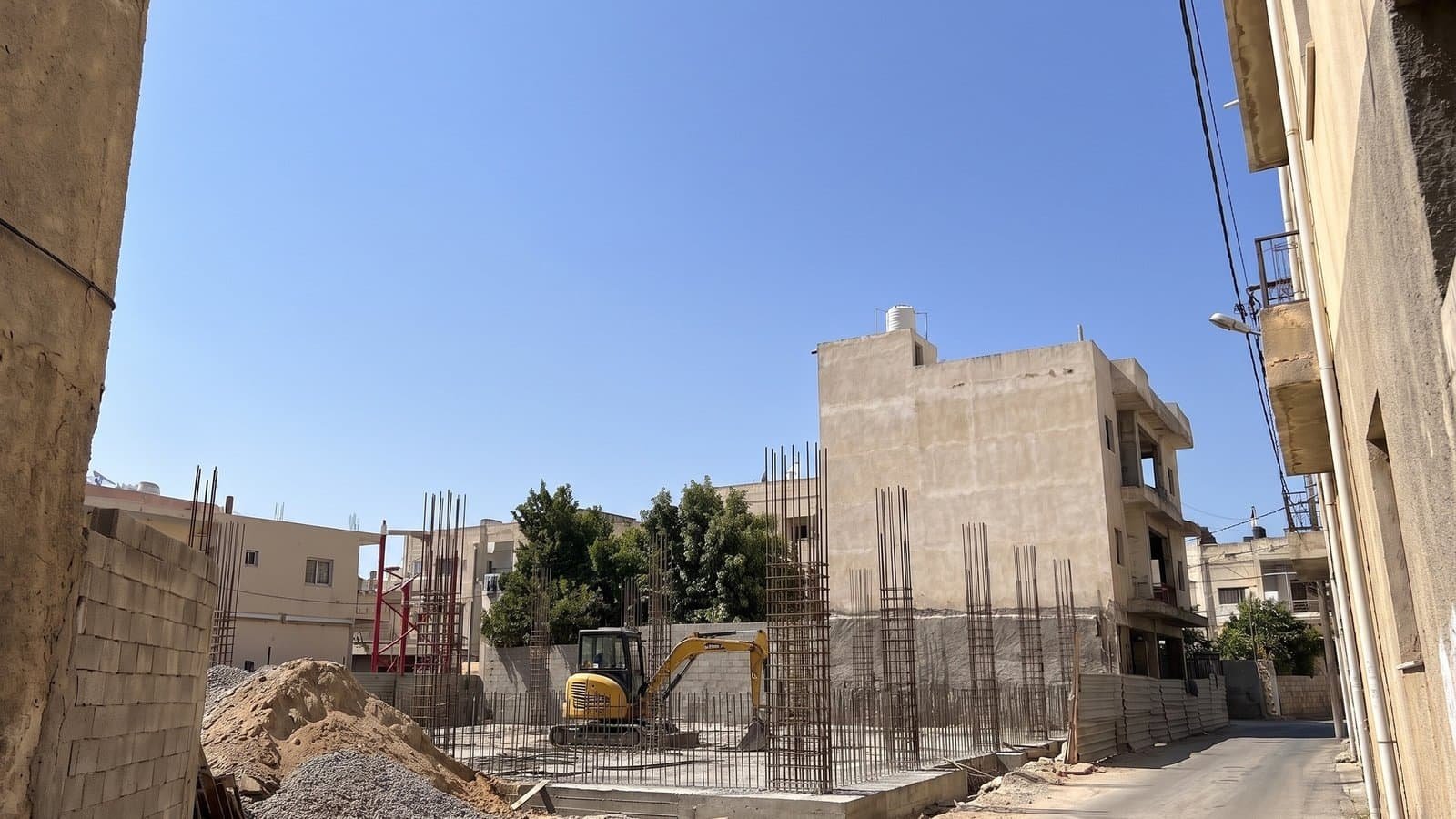 Building progress: before, the original photo